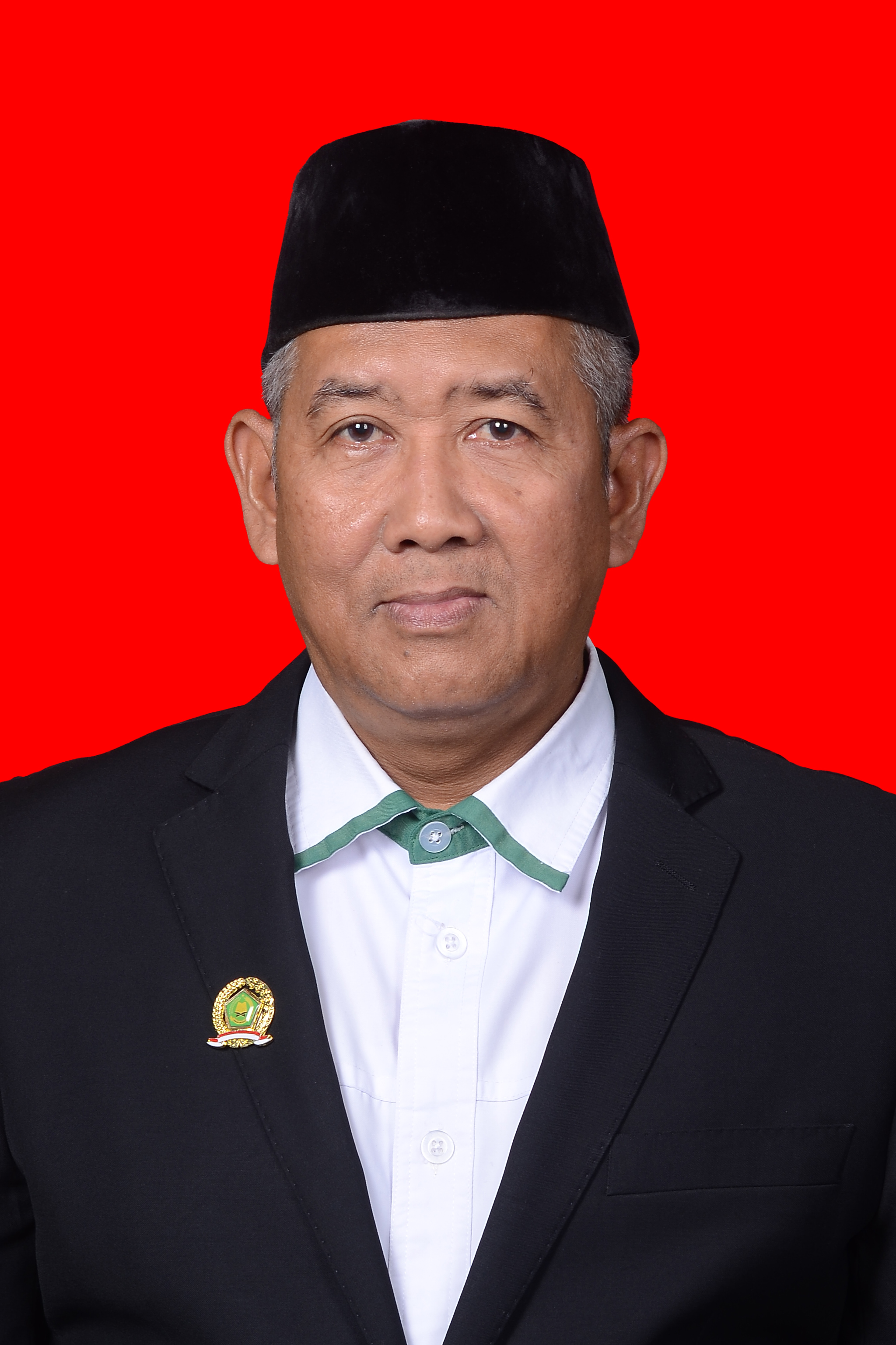 H. Ach. Roziqin, S. Ag