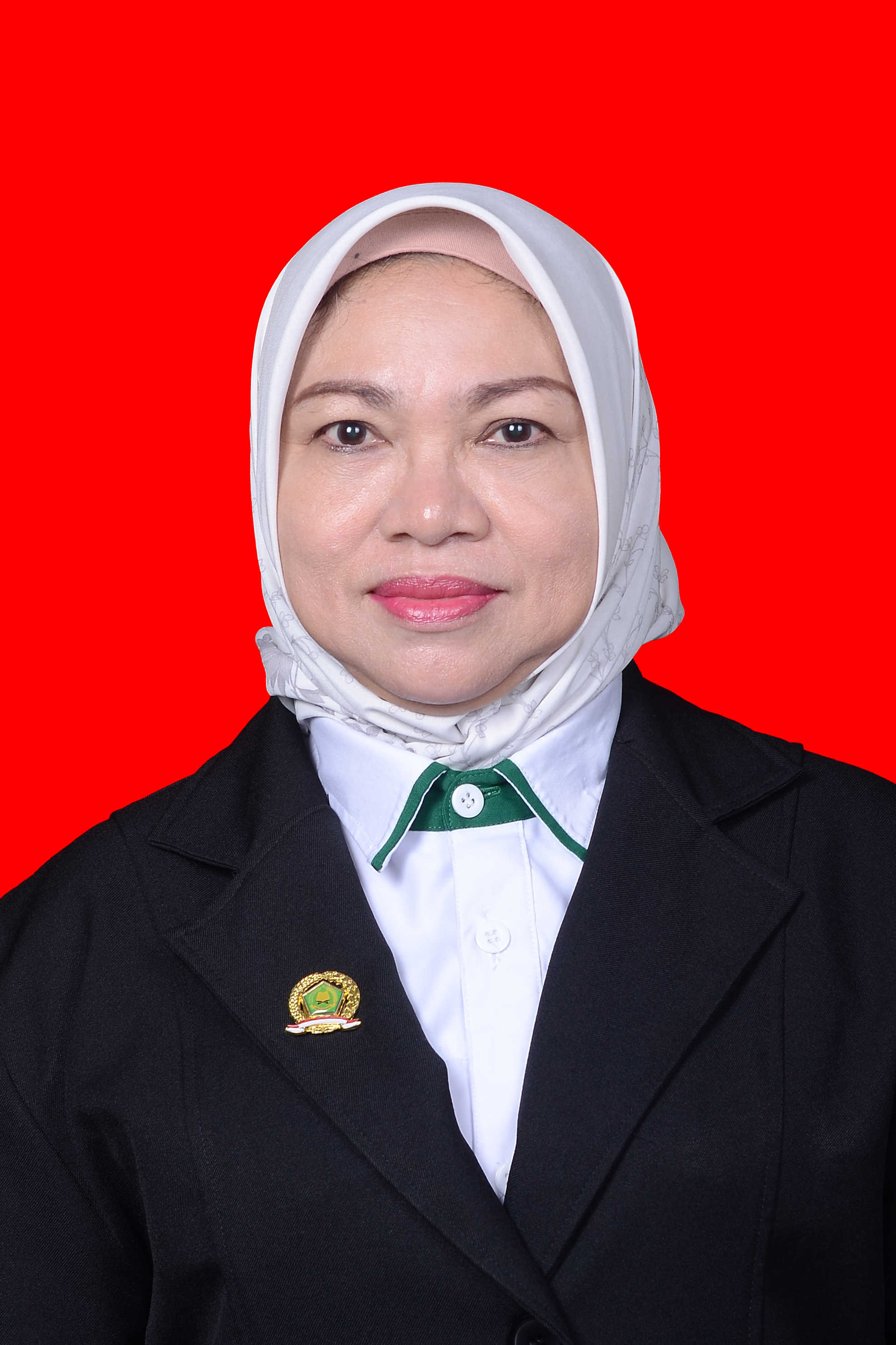 Dra. Hj. Rahmawati, M.Pd