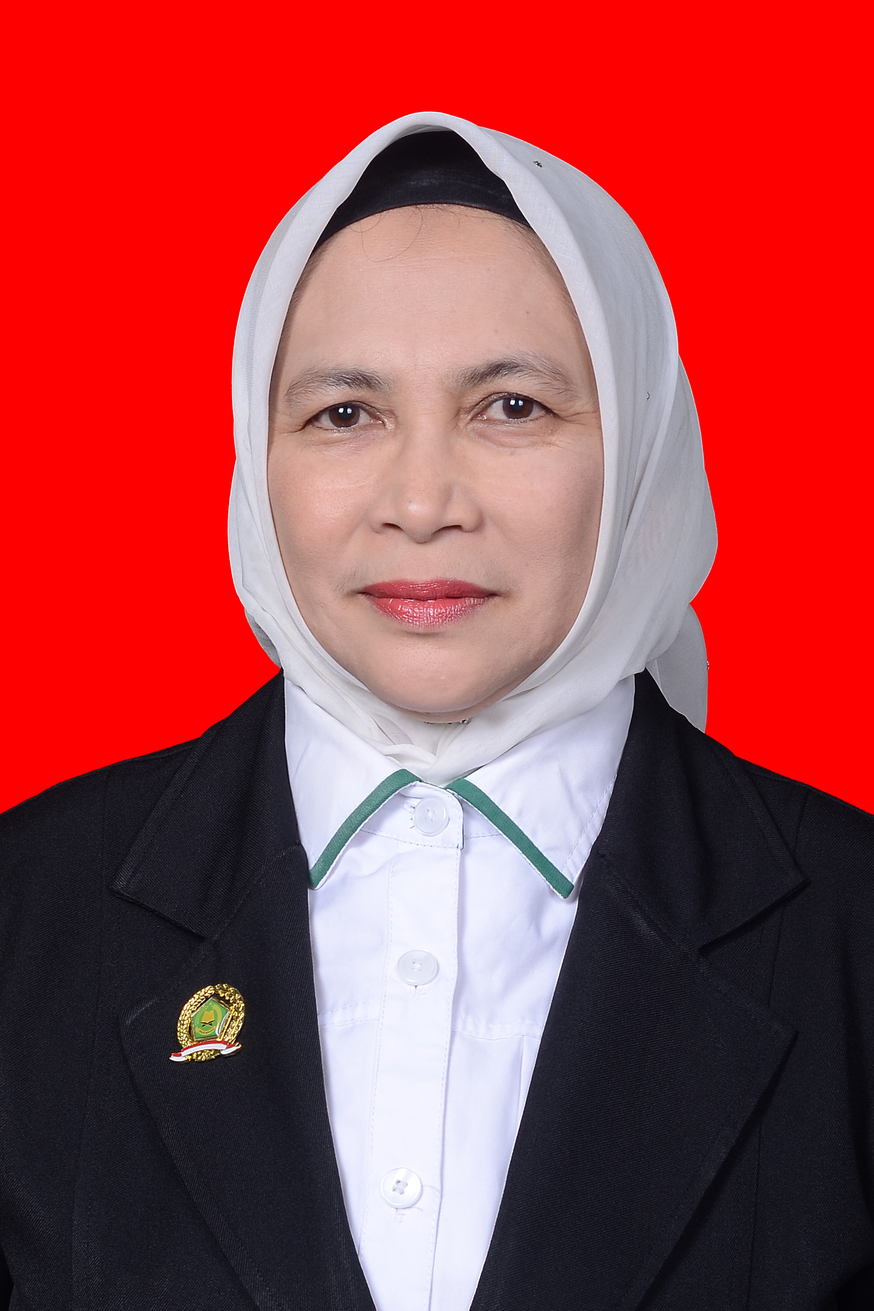 Hj. Ermina. S.Pd